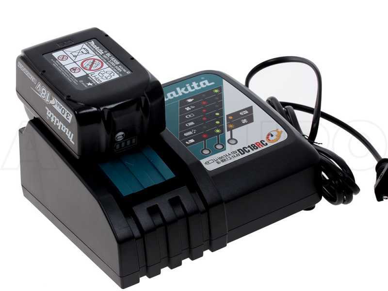 Chargeur de batterie Makita + batterie 18V 3ah